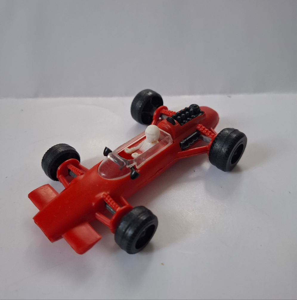 Vintage Lotus Formula One Race Car No. 4 – Pennzoil Red Plastic Toy 4 1/2"