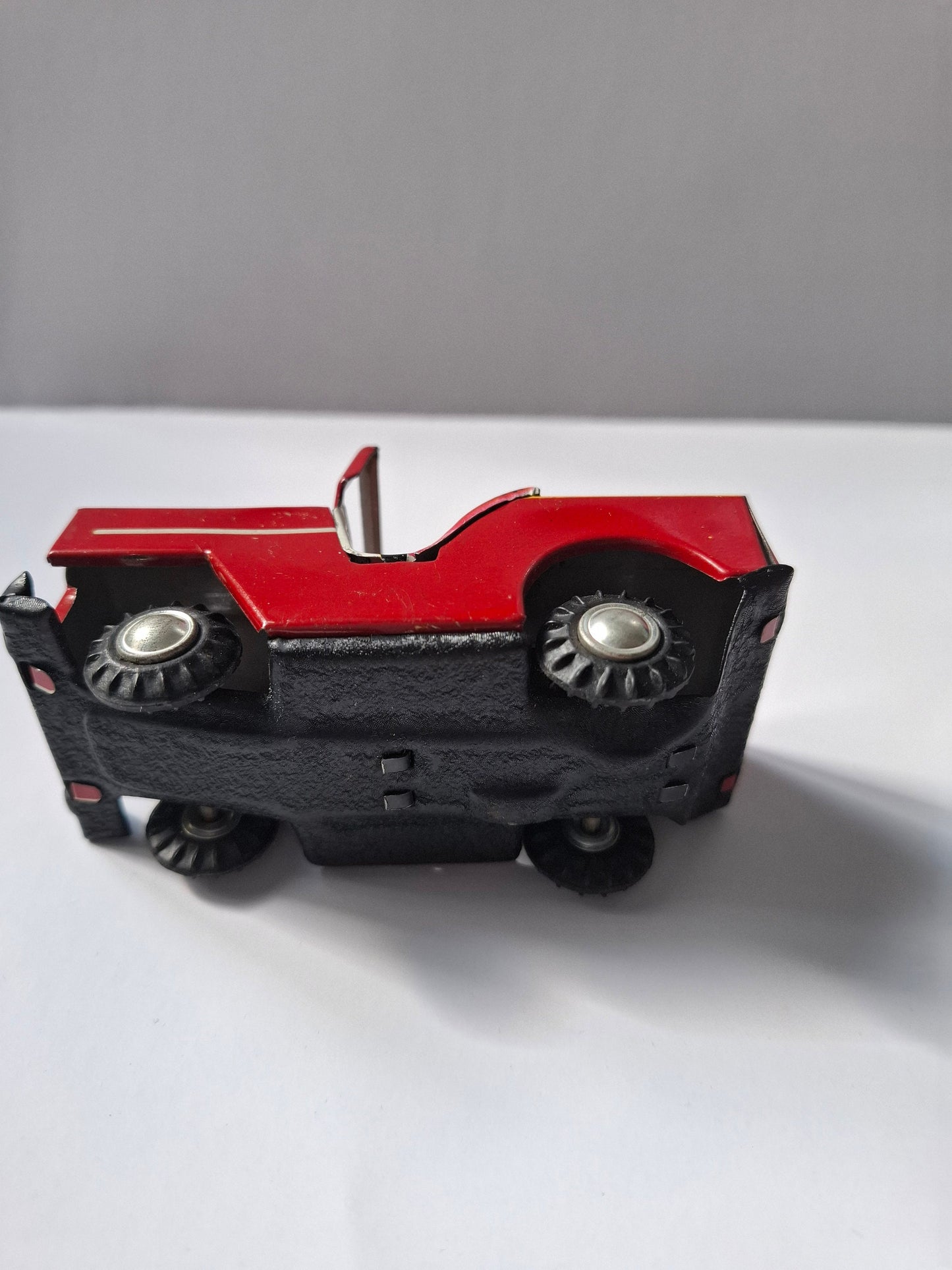 Charming Nostalgic Vintage  Tin Toy: Red Jeep - Classic Collectible Treasure