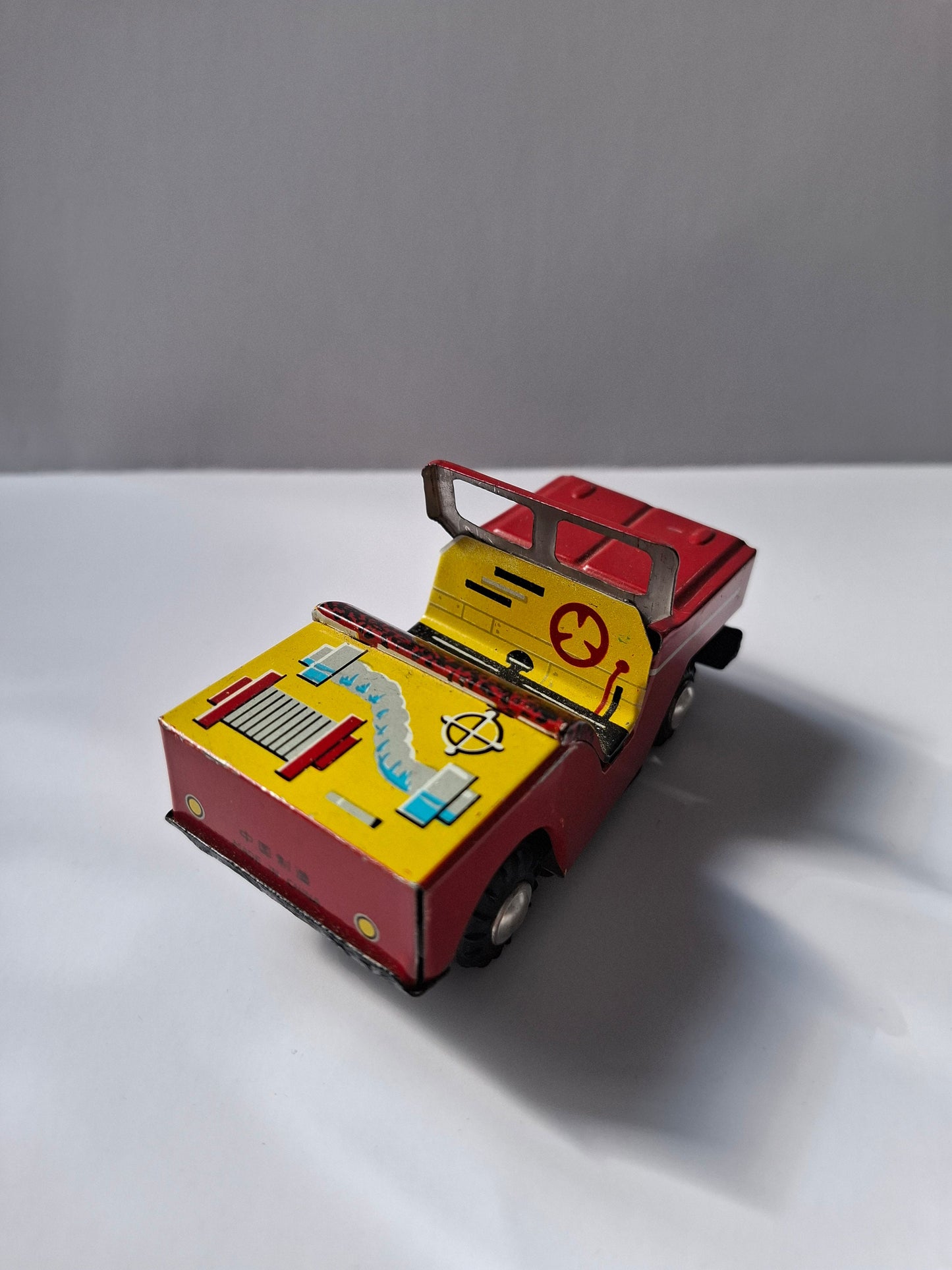 Charming Nostalgic Vintage  Tin Toy: Red Jeep - Classic Collectible Treasure