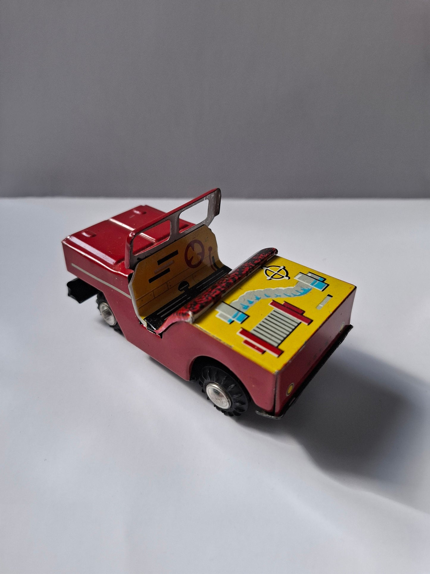 Charming Nostalgic Vintage  Tin Toy: Red Jeep - Classic Collectible Treasure