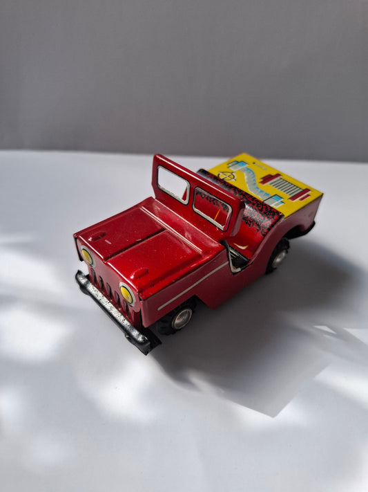 Charming Nostalgic Vintage  Tin Toy: Red Jeep - Classic Collectible Treasure