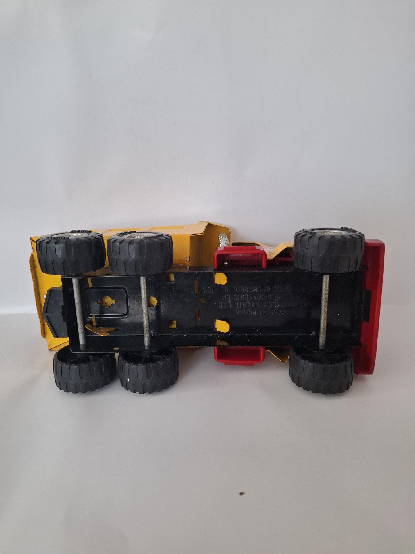 Nylint Pressed Steel and Plastic Sand & Gravel Small Dump Truck 8.25" Yellow Red
