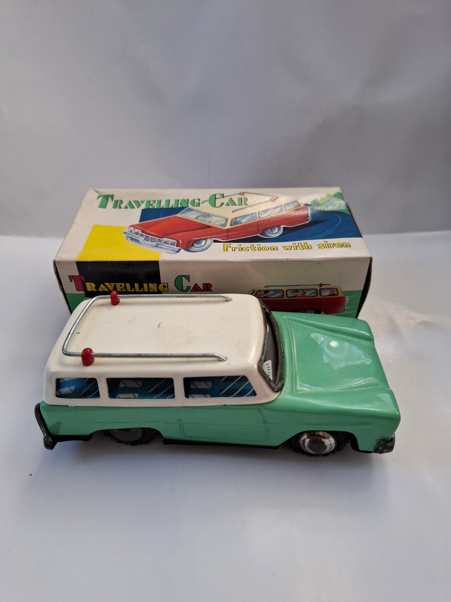 Rare Candy Green Station Wagon Car Tin Friction Toy MF 731 -made in china (BOXED)