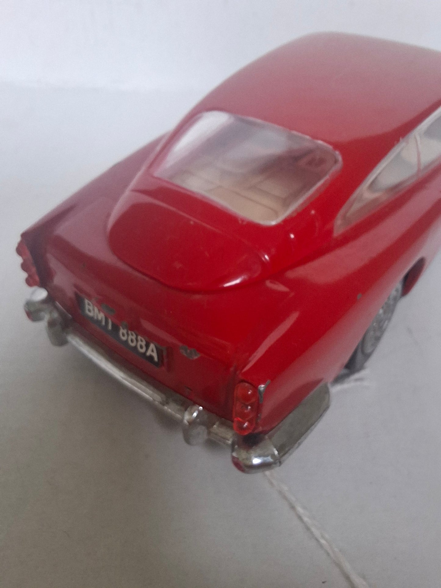 Vintage Diecast Aston Martin DB5 — Approx. 1:30 Scale — Solid Metal Model, Red — Parts Missing / Wear (1980s look)