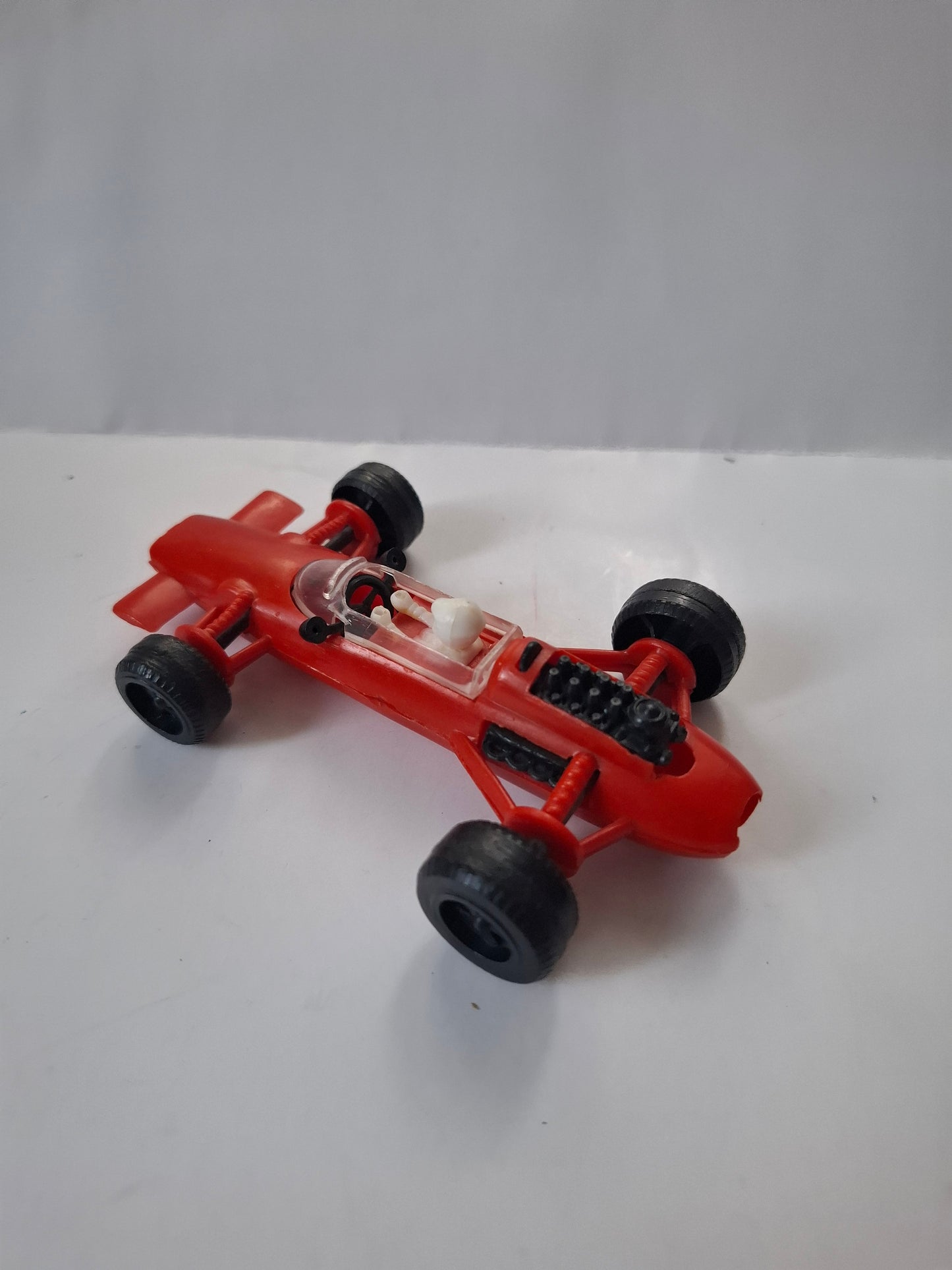 Vintage Lotus Formula One Race Car No. 4 – Pennzoil Red Plastic Toy 4 1/2"