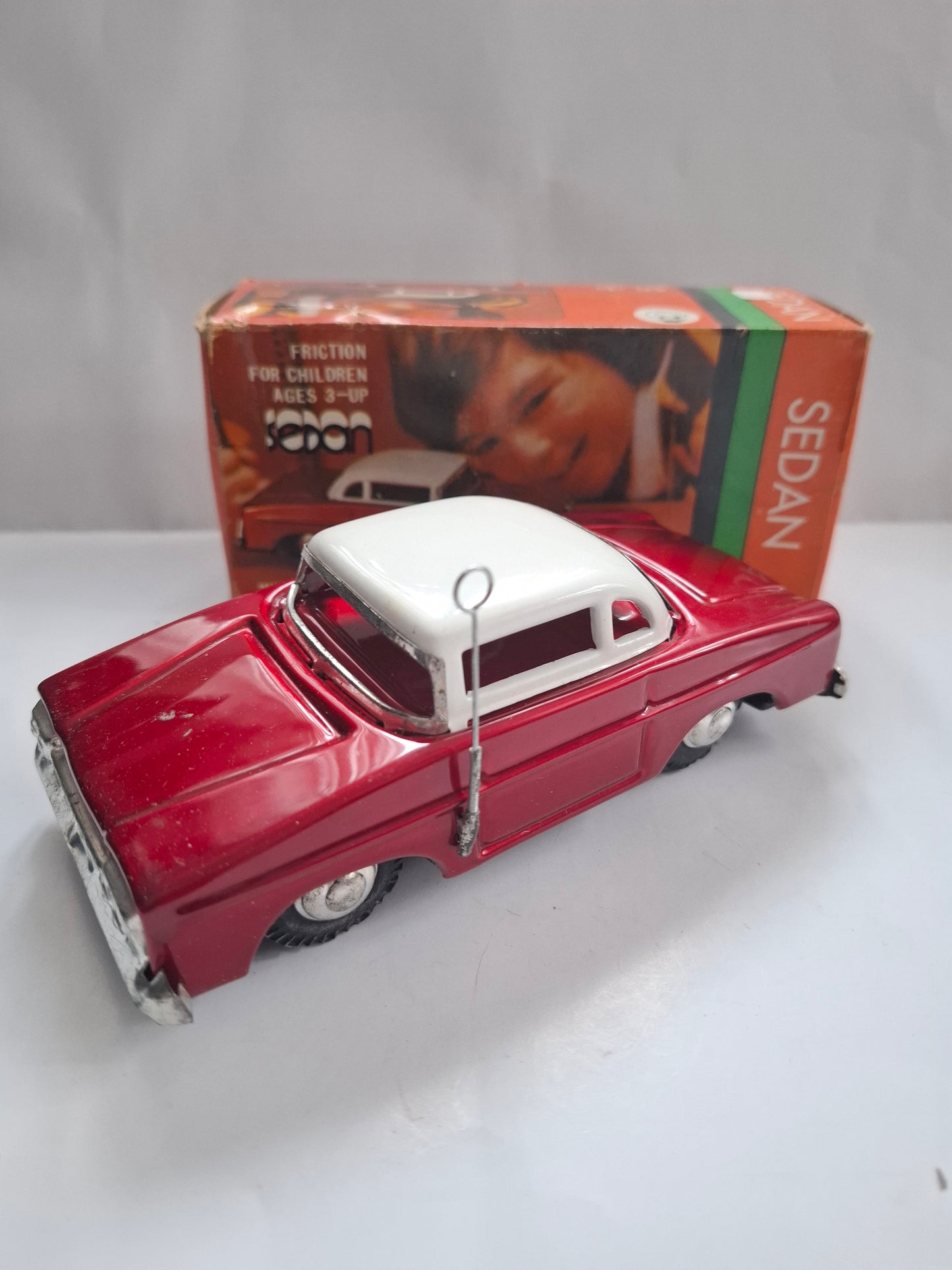 Vintage MF 988 Dong Feng Sedan – Tin Friction Toy with Original Packaging
