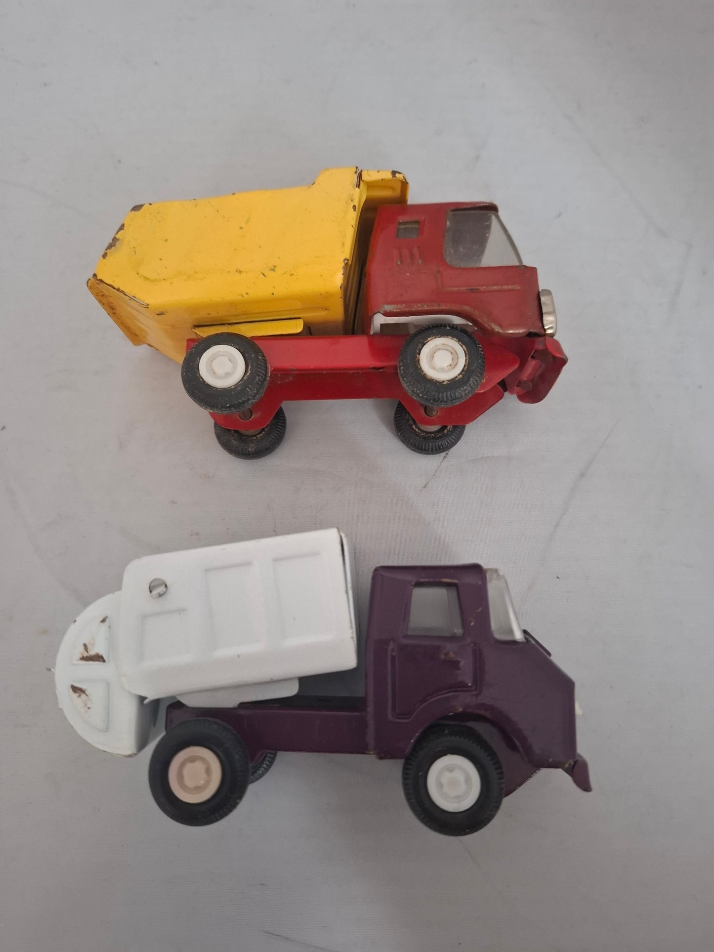 Vintage Lot of 2 pressed steel red metal ruck toys - made in Japan