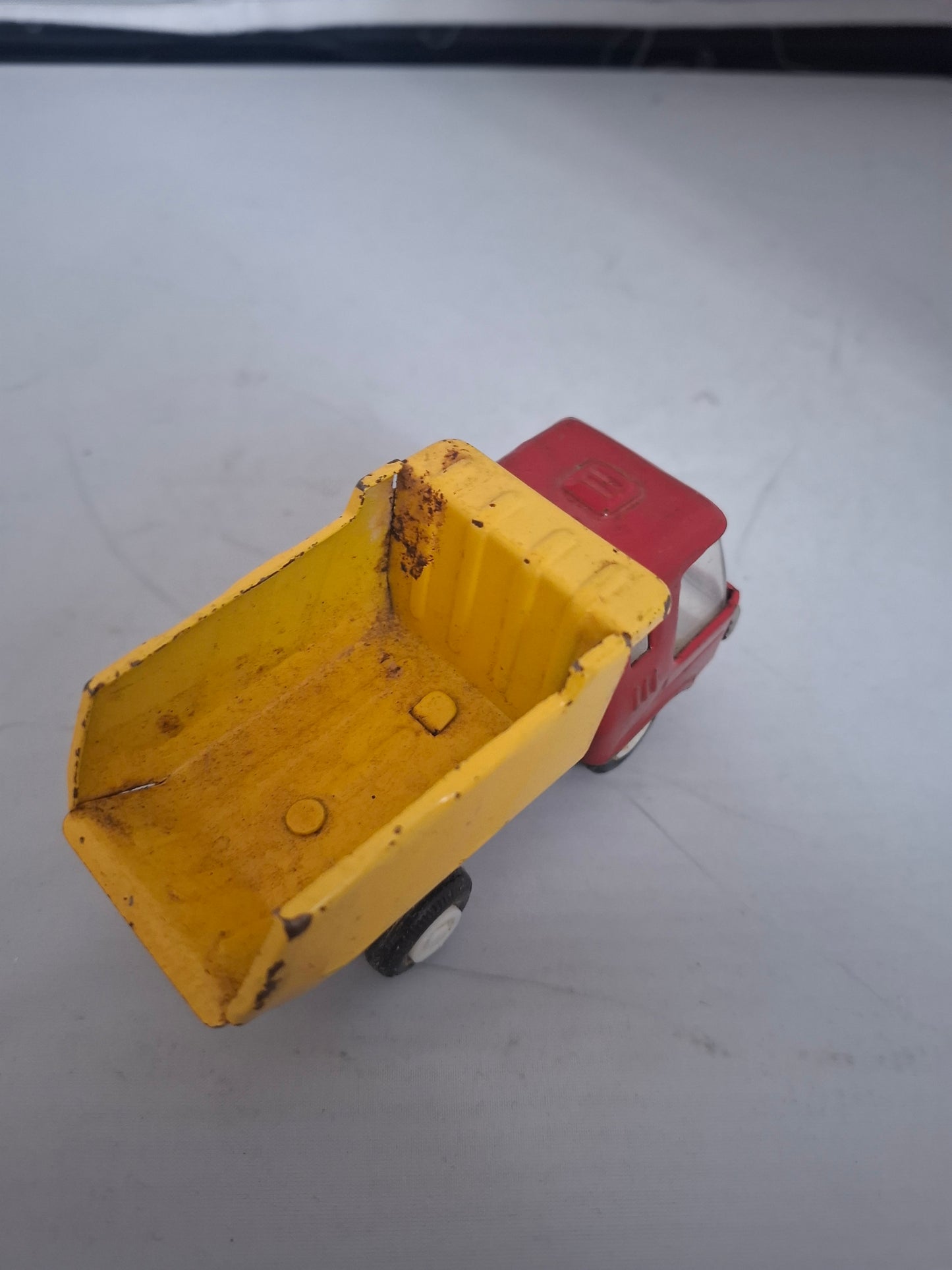 Vintage Lot of 2 pressed steel red metal ruck toys - made in Japan