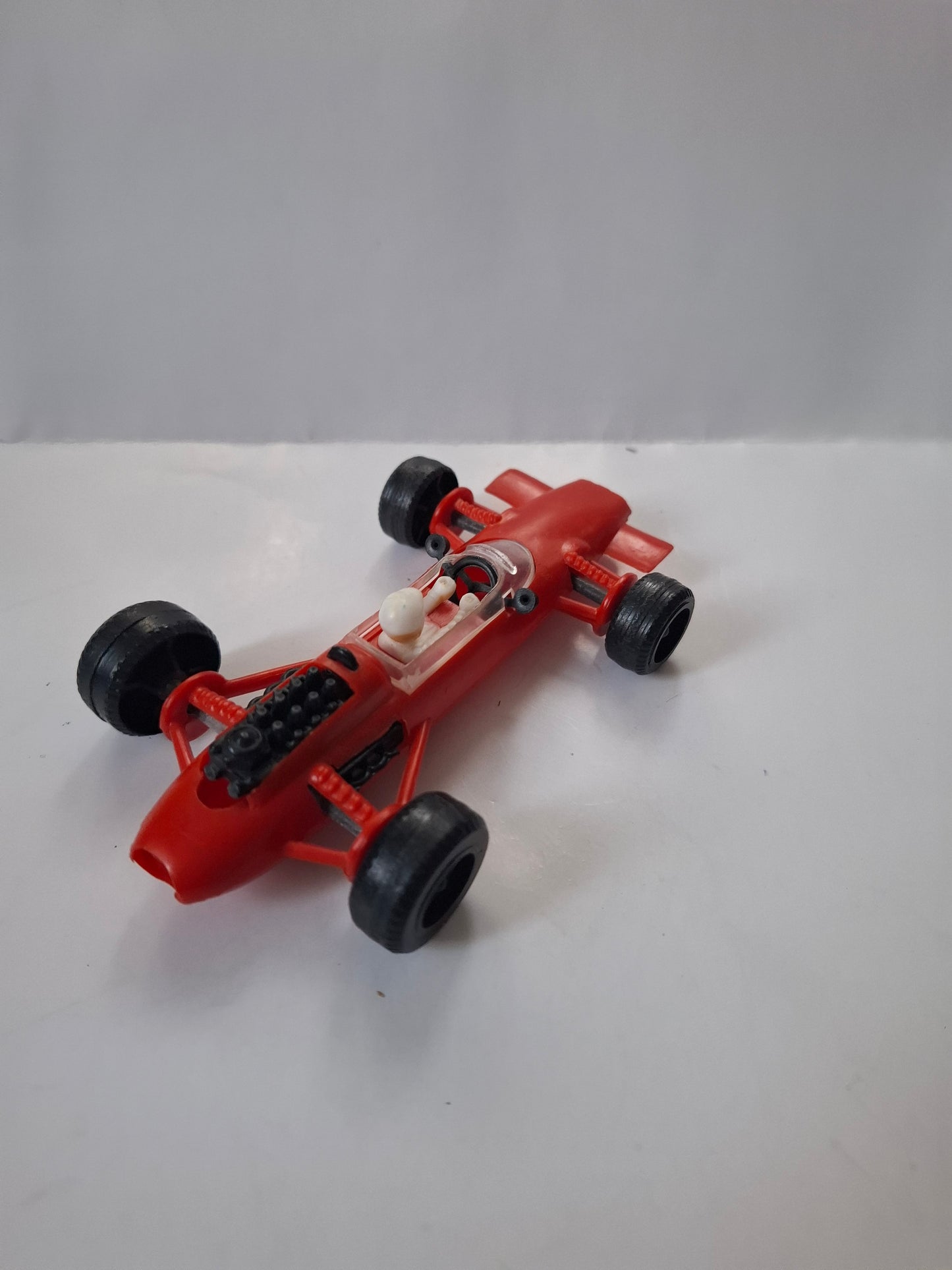Vintage Lotus Formula One Race Car No. 4 – Pennzoil Red Plastic Toy 4 1/2"