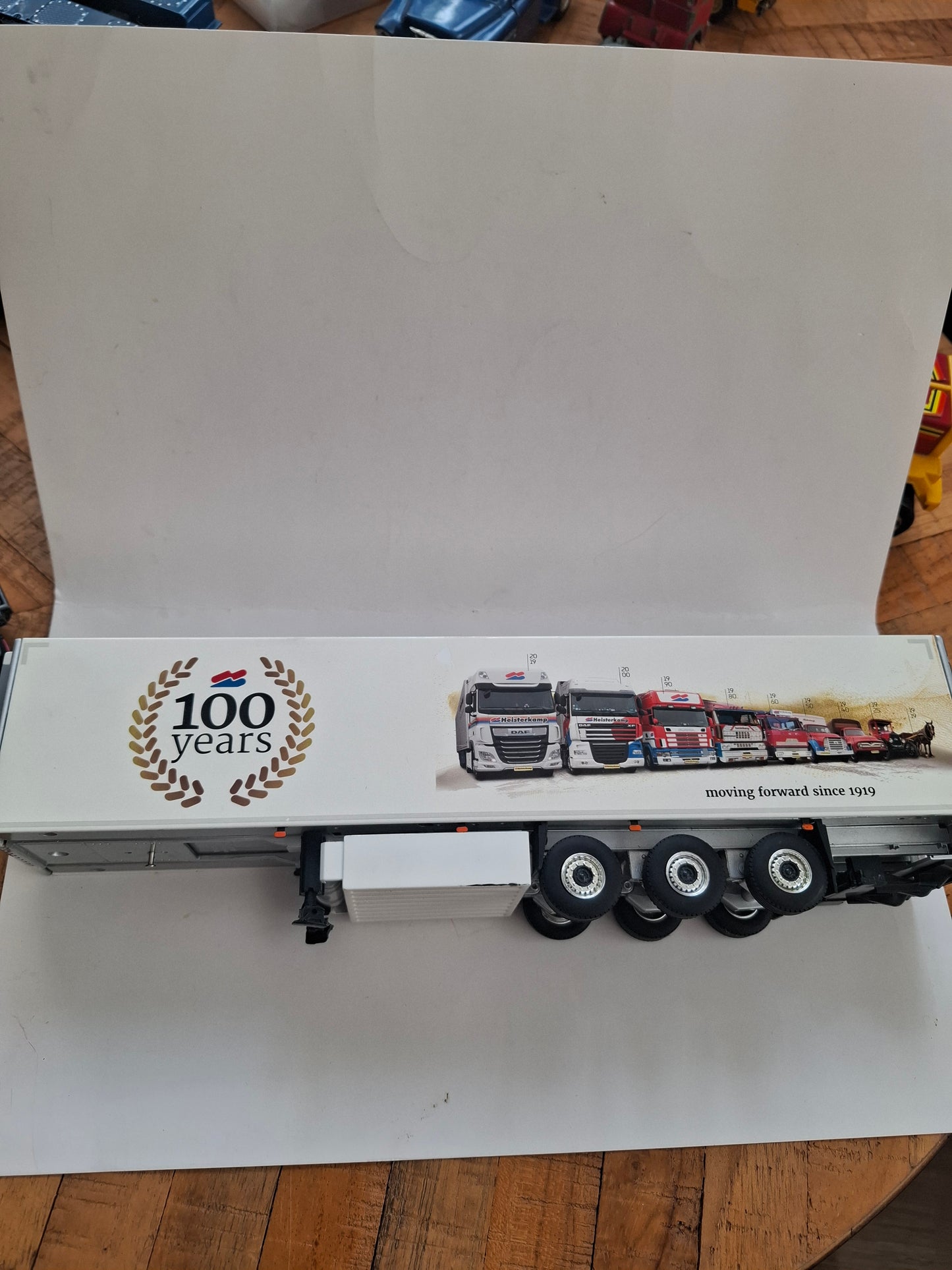 WSI 1:50 DAF XF Super Space Cab “100 Years Heisterkamp” Die-Cast Model Truck & Reefer Trailer