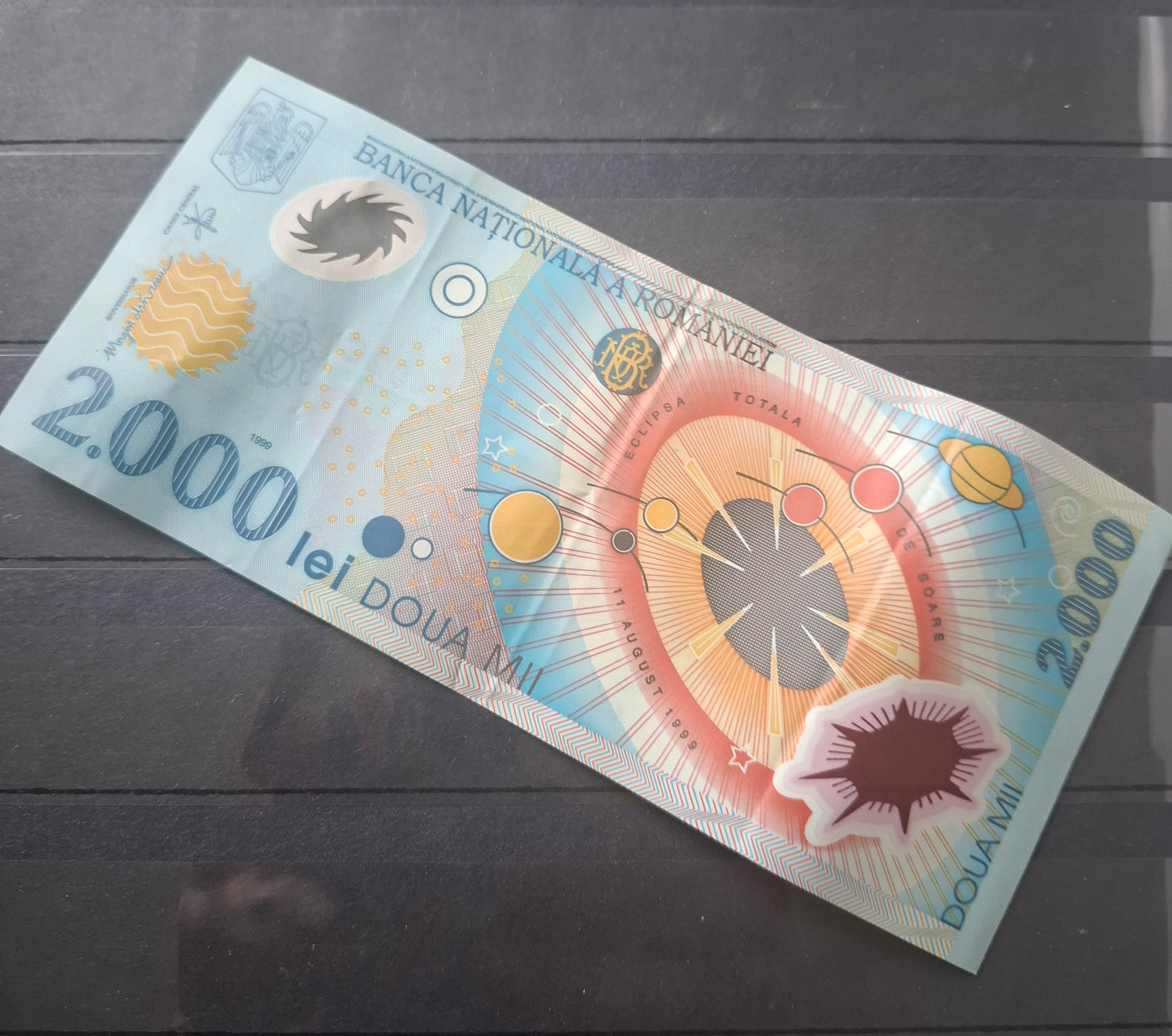 Romania 2000 Lei 1999 Polymer Banknote EF/XF Pick P-111a Solar Eclipse Commemorative