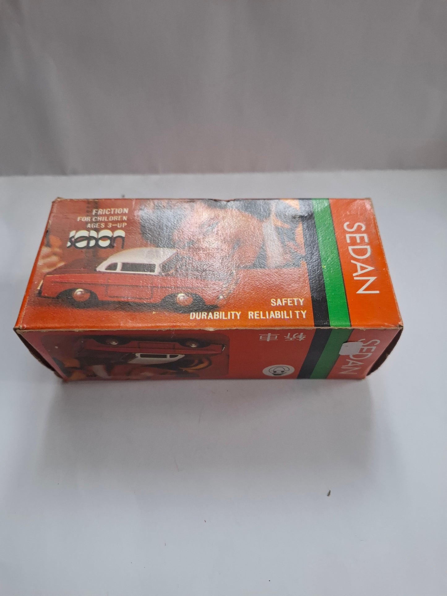Vintage MF 988 Dong Feng Sedan – Tin Friction Toy with Original Packaging