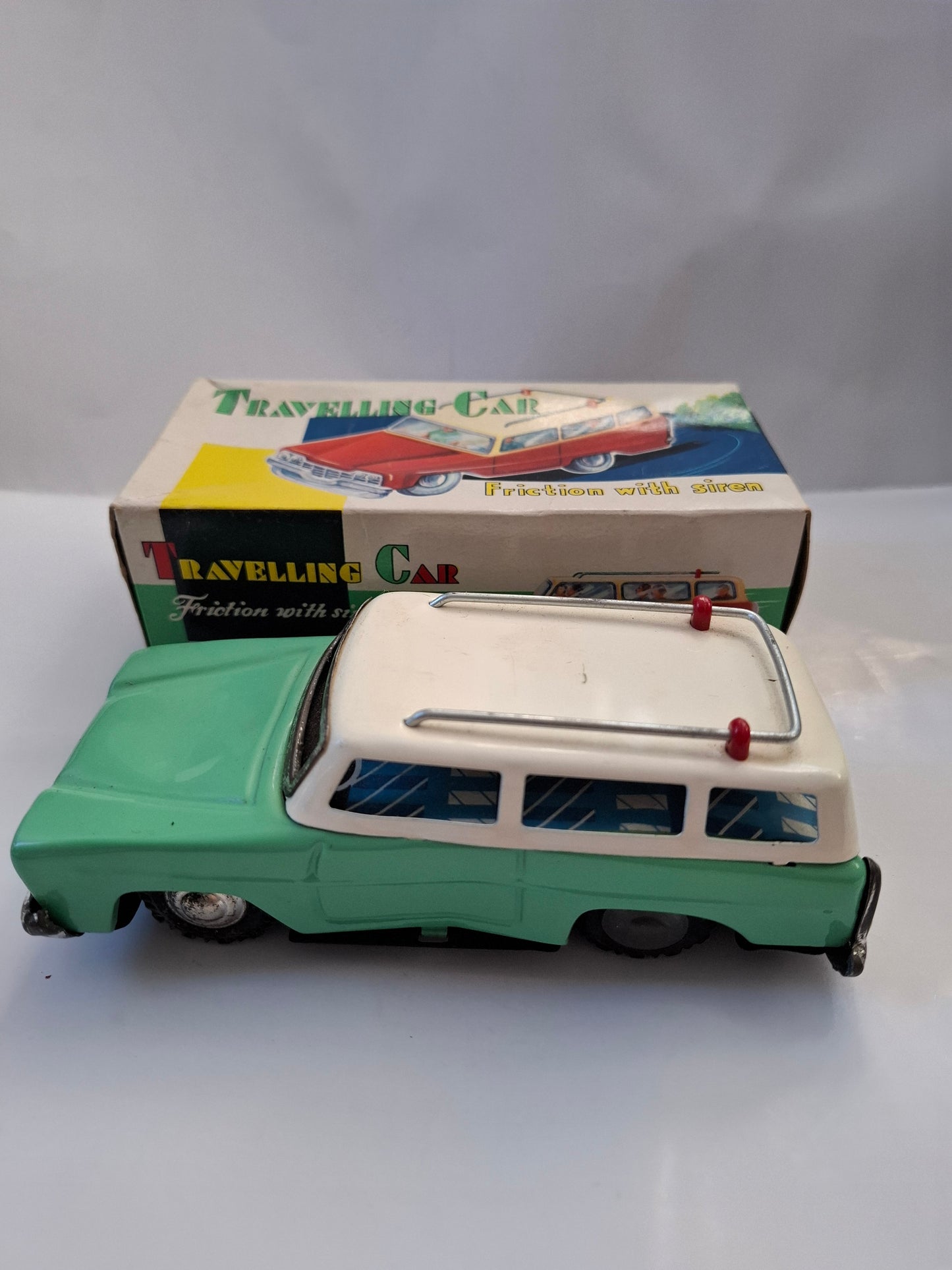 Rare Candy Green Station Wagon Car Tin Friction Toy MF 731 -made in china (BOXED)