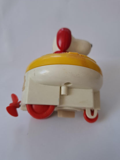 Very Cute little Vintage Blue Box Wind-Up Dog Toy in Yellow Life Raft - looks like snoopy :)