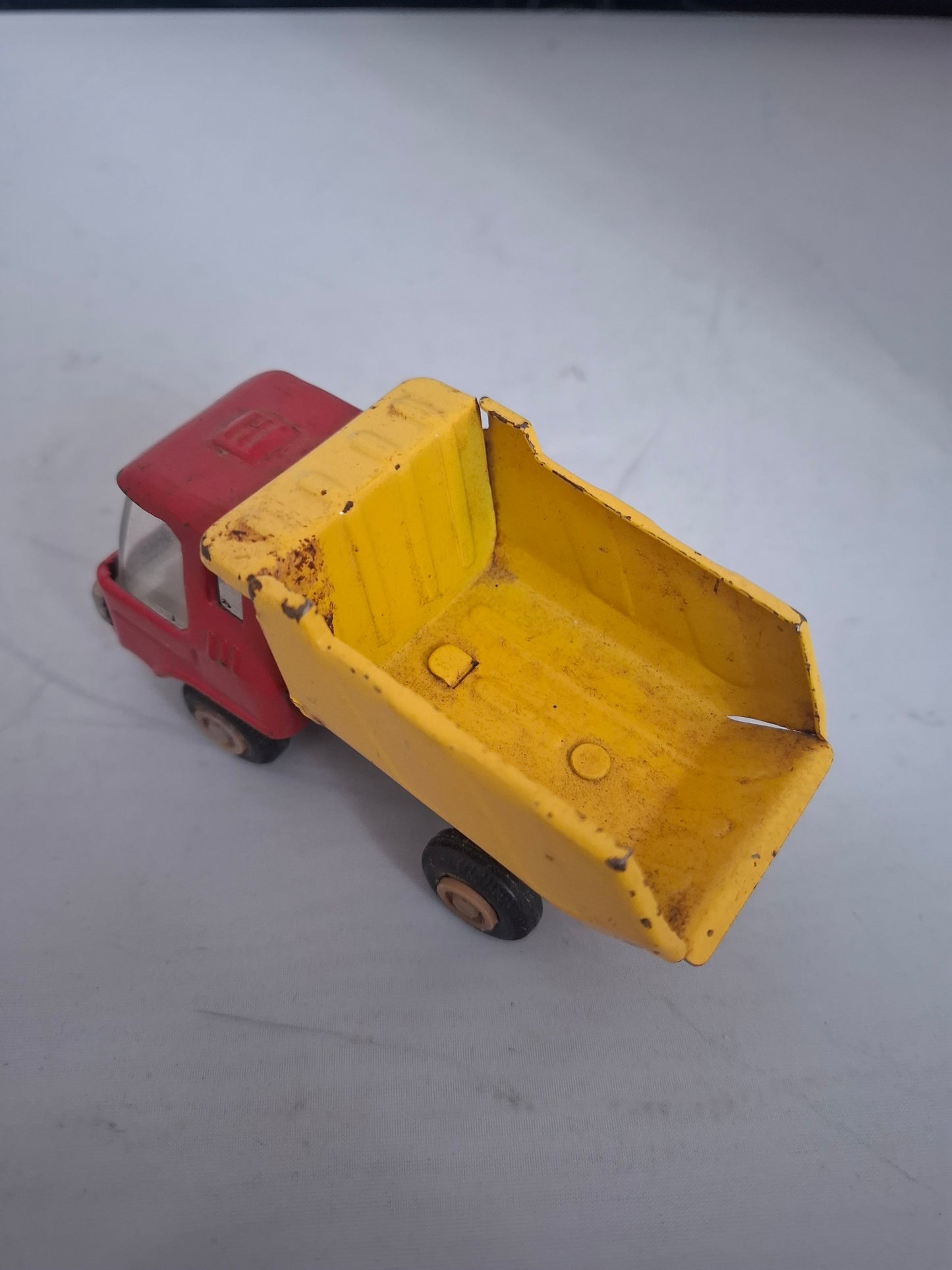 Vintage Lot of 2 pressed steel red metal ruck toys - made in Japan