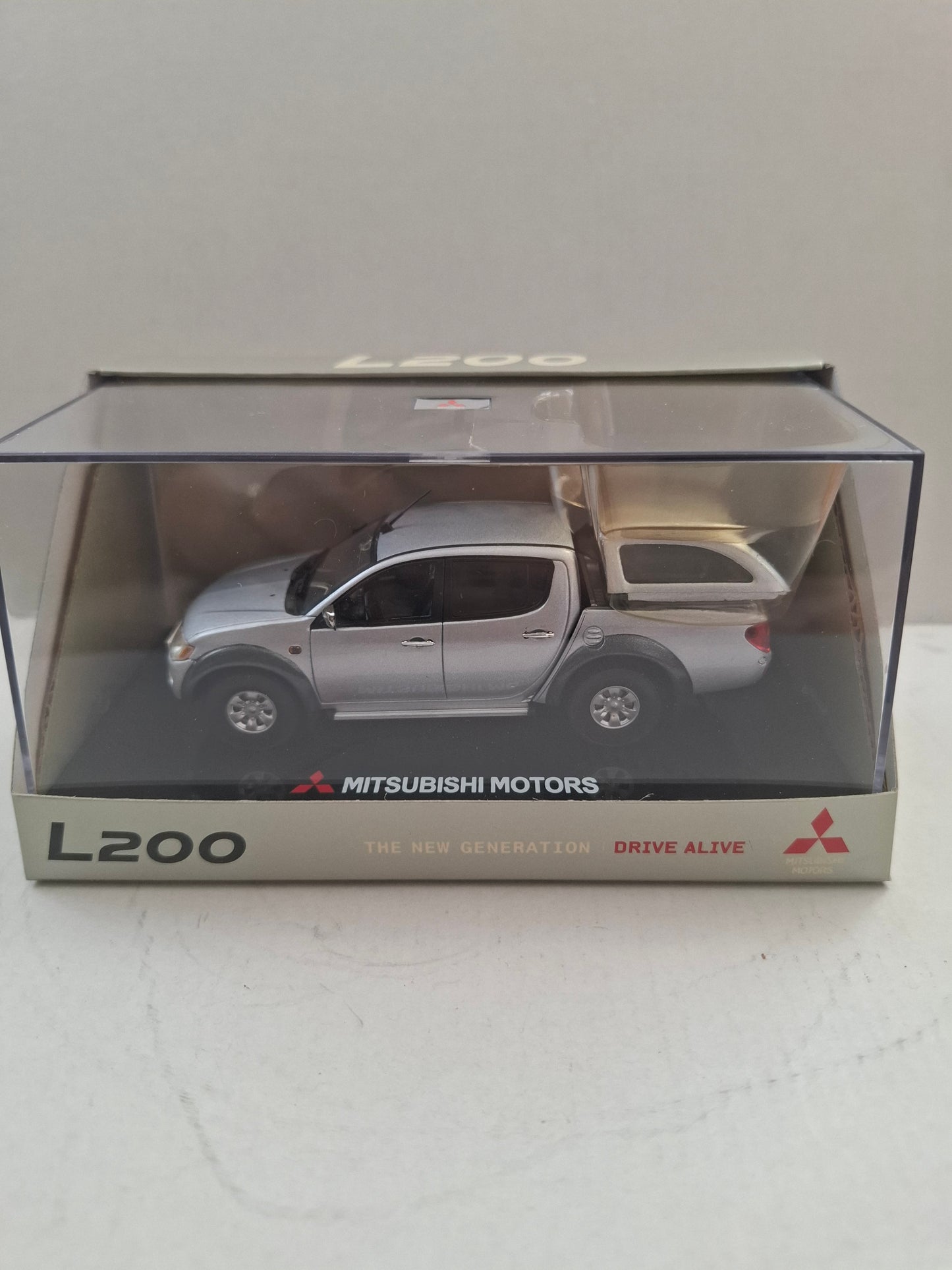 Mitsubishi L200 1:43 Diecast Dealer Model – Black Mica / Grey Mica / Silver Metallic – Like New