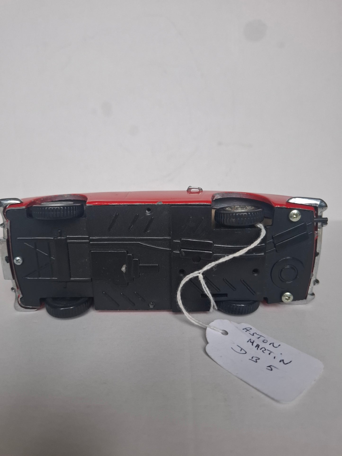 Vintage Diecast Aston Martin DB5 — Approx. 1:30 Scale — Solid Metal Model, Red — Parts Missing / Wear (1980s look)