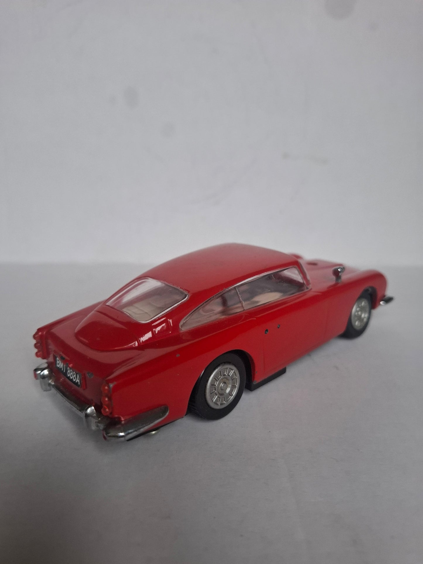 Vintage Diecast Aston Martin DB5 — Approx. 1:30 Scale — Solid Metal Model, Red — Parts Missing / Wear (1980s look)