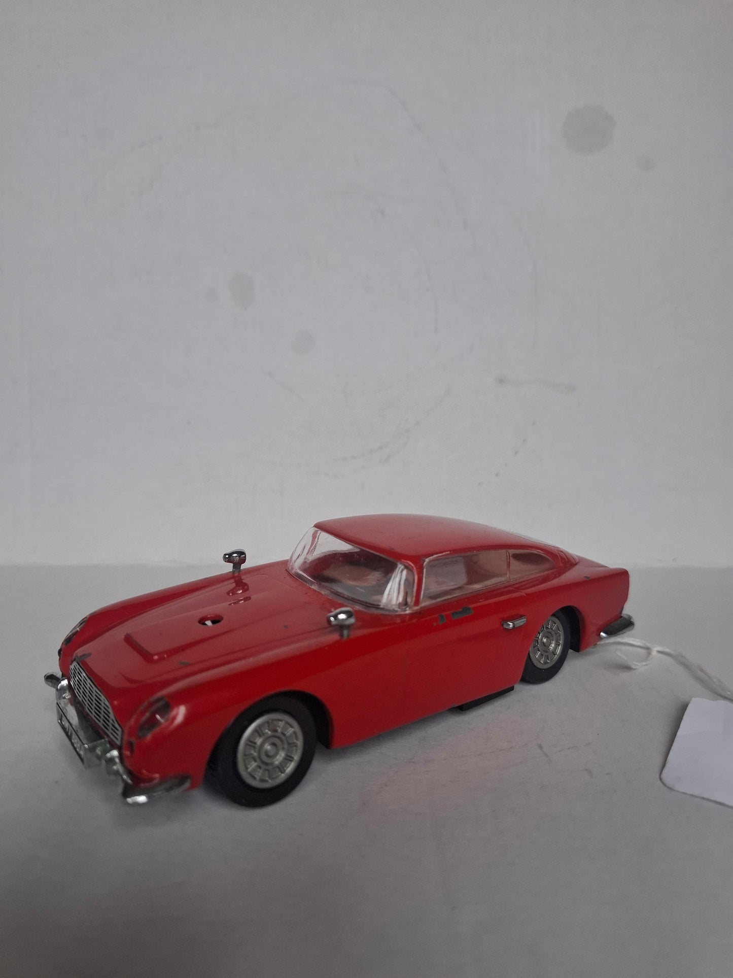 Vintage Diecast Aston Martin DB5 — Approx. 1:30 Scale — Solid Metal Model, Red — Parts Missing / Wear (1980s look)